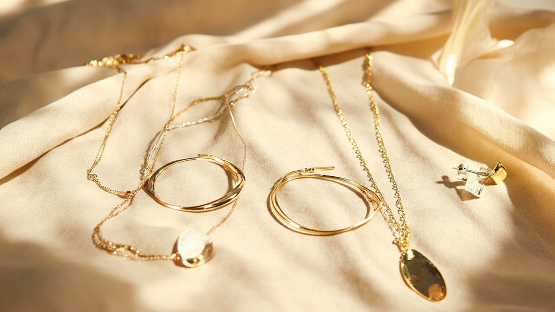 modern jewelry pieces on linen in soft daylight, showcasing quality and minimalist design